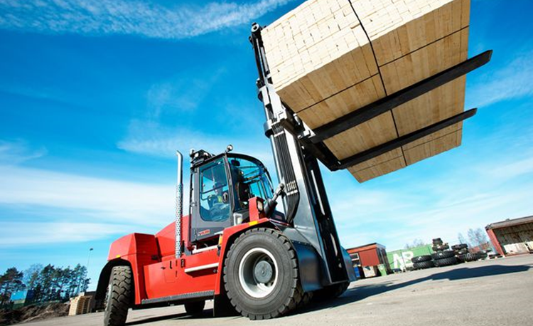 Large Forklift carrying wood